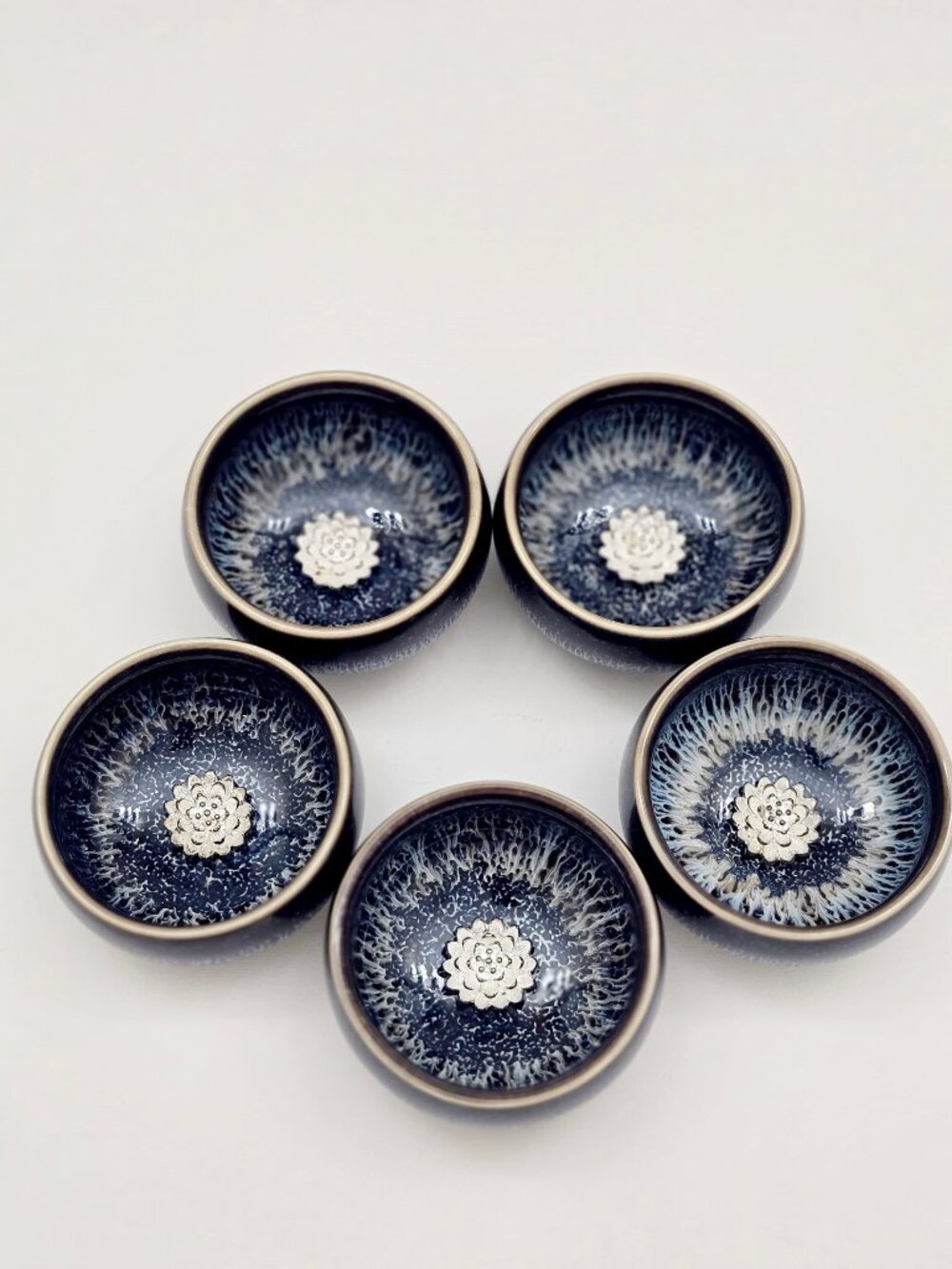 Set of 5 Jianzhan-Style Ceramic Tea Cups with Silver Lotus